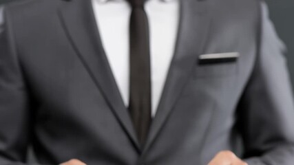 A business professional holding a blank card, A business professional in formal attire holds a blank card