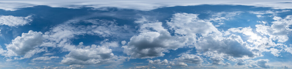 Obraz premium Blue sky panorama with Cirrus clouds in Seamless spherical equirectangular format. Full zenith for use in 3D graphics, game and editing aerial drone 360 degree panoramas for sky replacement.
