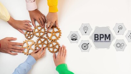 A group of diverse hands cooperates around wooden gears, symbolizing teamwork and strategic planning of business processes in a modern office setting. Raster - Powered by Adobe