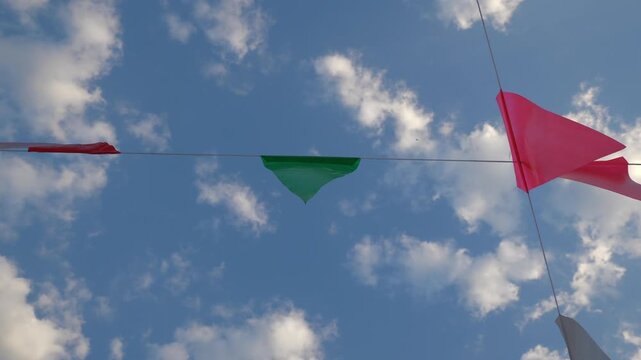 sunny day blu sky holiday flags decoration up view panorama 4k thailand 