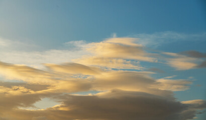 Obraz premium Sunset in the clouds. Sky background.