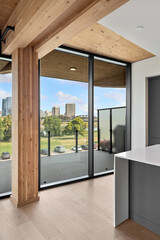 Large window in a building with a view of a city