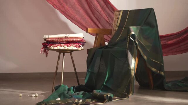 Mid shot of Indian Kanchipuram saree draped on an armchair in 4K, showing rich fabric texture, elegant folds, and traditional craftsmanship for fashion and cultural visuals.