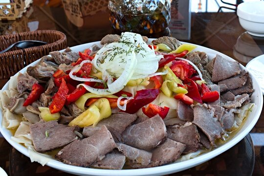 Gyulchatai with Horse meat and Horse tripe in traditional Kyrgyz restaurant Dastorkon in Karakol city. Kyrgyzstan. Asia.
