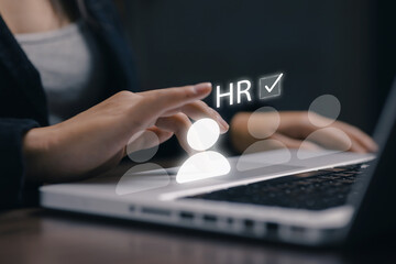 A human resources manager selects a candidate through a digital HR interface, representing recruitment, talent management, employee selection, workforce analytics, and human resource technology.