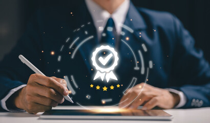 A business professional confirms a five-star quality badge on a digital interface, representing quality assurance, customer satisfaction, performance excellence, service evaluation.