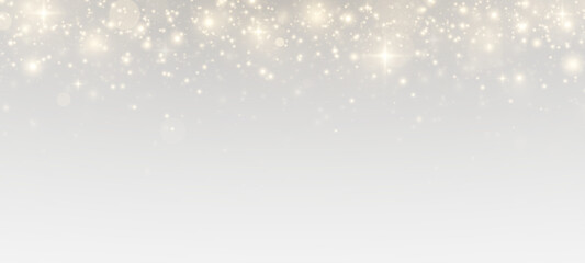 Glistering particles and sparkling starlight across a bright festive background. Twinkling lights, golden highlights, and magical bokeh for a holiday atmosphere.