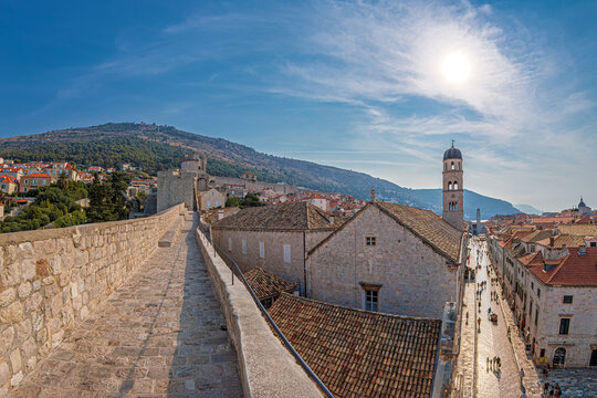 Old Town near Pile Gate, with Stradun Street, the main pedestrian street paved with limestone from the 13th century. View from the medieval city walls, Dubrovnik, Croatia