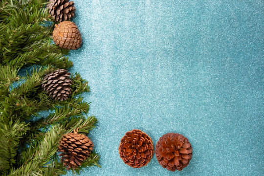 Christmas ornaments, beautiful Christmas decorations positioned on colored EVA foam, selective focus, top view.