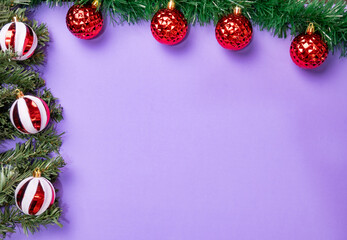 Christmas ornaments, beautiful Christmas decorations positioned on colored EVA foam, selective focus, top view.