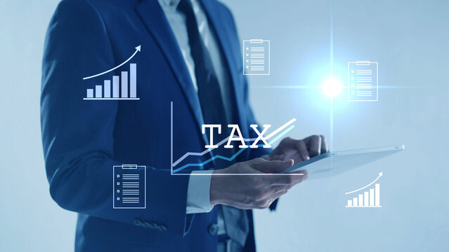 Digital tax filing Tax return financial planning analyzing  data revenue deductions filing income tax online payment mobile app computer technology. Business tax management economy 