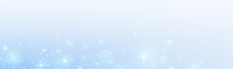 Festive background with sparkling dust and blue stars. Glitter bokeh lights isolated on a transparent background.