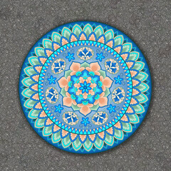Round floral pattern shadow effects, rocky backdrop. Mandala. Decorative plate on stone wall.