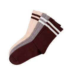 Set of three cozy striped socks in brown, pink, and gray on black background