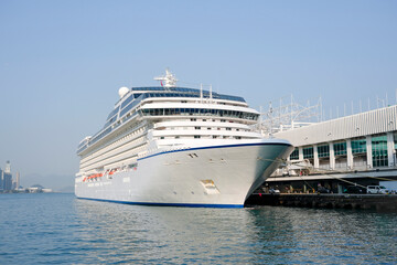 A cruise liner is a ship at the pier ready to set off on a long voyage.