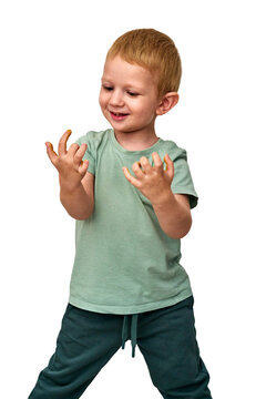Smiling Toddler Standing and Looking at Hands Isolated on White Background