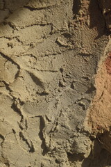 Parede com reboco de cimento cinza grosseiro