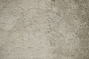Textura de reboco de cimento apressado em parede de casa