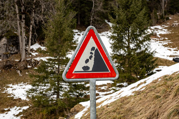 Rockfall warning sign in the Bernese Alps, Switzerland