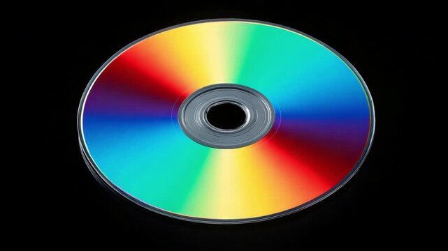 Reflective Compact Disc on a Black Background Displaying Colorful Light Patterns and Textures 4k video footage