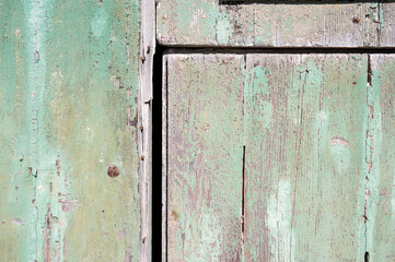 Old weathered limestone houses in vibrant colors in the coastal village of Marsaxlokk Marsaxlokk, Malta