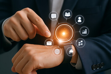 Businessman interacting with smart watch for digital communication and data analytics with futuristic virtual technology icons