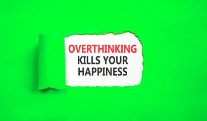 Overthinking kills your happiness symbol. Concept words Overthinking kills your happiness on white paper. Beautiful green paper background. Business overthinking kills happiness concept. Copy space.