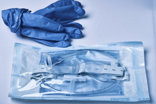 a complex of uridine and a urine collection bag in sterile packaging