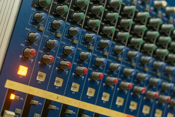 Fototapeta premium Professional Audio Mixer Control Panel Close-Up