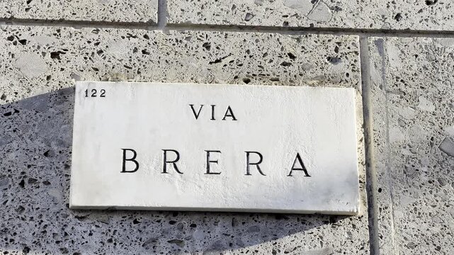 Close-up marble street sign Via Brera Milan Italy
