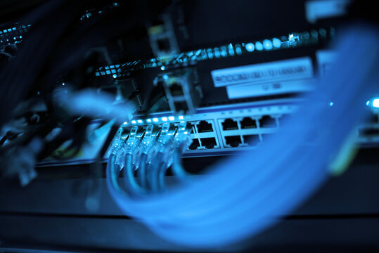 Network Switch with Fiber Optic Connections - Powered by Adobe