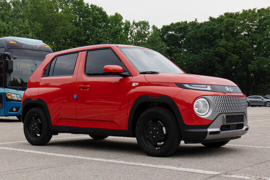 June 10, 2022, Seoul, South Korea - A red Hyundai Casper compact SUV parked in an outdoor parking lot.