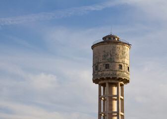 Water tower against the blue sky