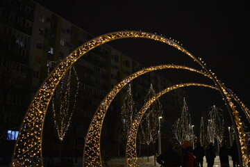 Christmas decoration on the streets in snow at night