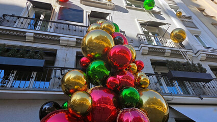 Festive christmas and new year decorations on urban street building