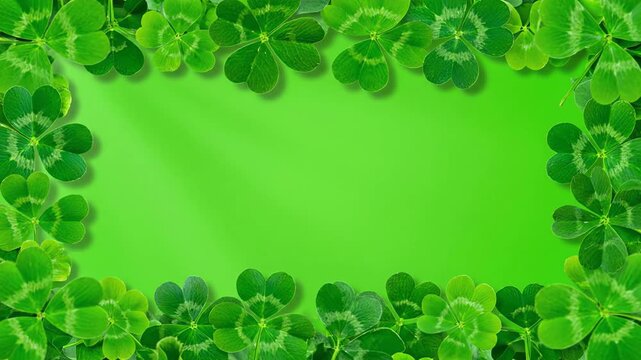 A vibrant Saint Patrick's Day background featuring a frame of four leaf clovers on a green screen.