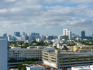 Fototapeta premium Aerial shot of hotels, condos and skyscrapers in the skyline at South Beach in Miami Beach Florida USA