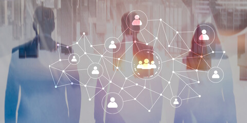 Businesspeople with digital social network icons and hologram overlay on city background