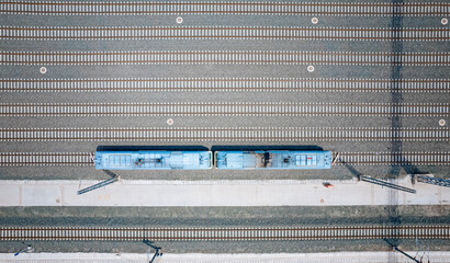 A Blue Train Among Parallel Tracks © wendi