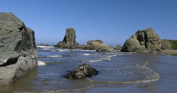 Sea stacks at the pacific coast in summer morning clear day at Bandon beach in Oregon.