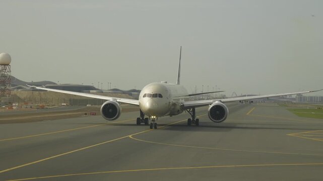 sunny day abu dhabi city international airport ready to departure line aircraft passenger side window panorama 4k united arab emirates