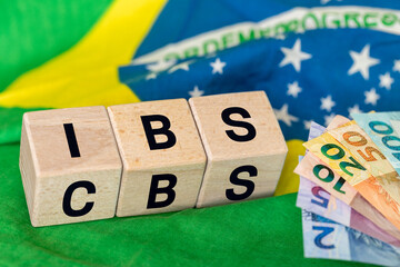 Brazil Finance and taxes. IBS and CBS written on a wooden block IBS. Concept, Brazilian tax reform,...