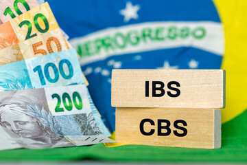 Brazil Finance and taxes. IBS and CBS written on a wooden block IBS. Concept, Brazilian tax reform,...