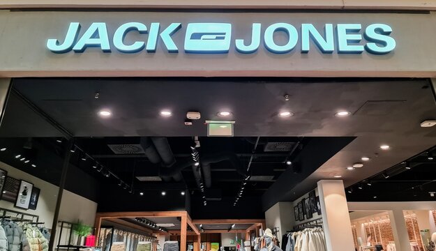 Kiel, Germany - 13. December 2025: JACK & JONES brand logo above a retail store entrance