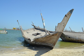Detail and closeup of old and colored boat wooden hull, 