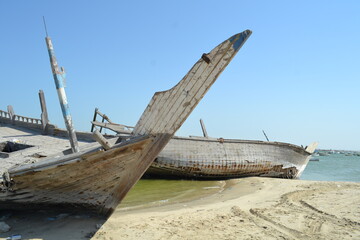 Detail and closeup of old and colored boat wooden hull, 