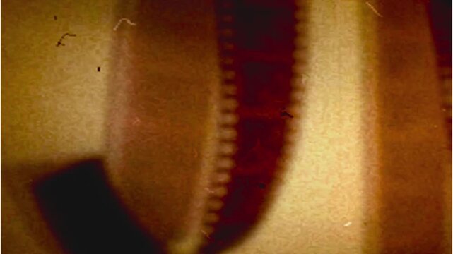 Extreme Close-up of Vintage Film Reel Teeth and Sprocket Detail