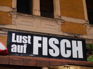 Delicious Fresh Fish Gourmet Signage in Urban Setting