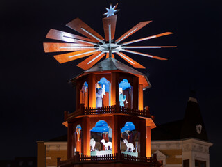 Traditional German Christmas Pyramid Illuminated at Night