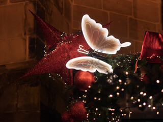 Glowing Butterfly Ornament on Festive Holiday Decoration